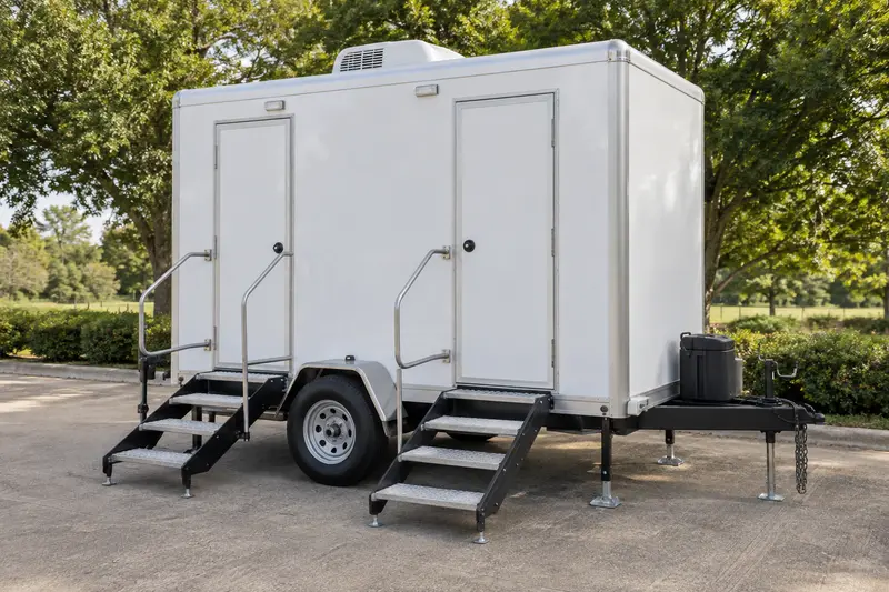 Restroom trailer in an outdoor event setting
